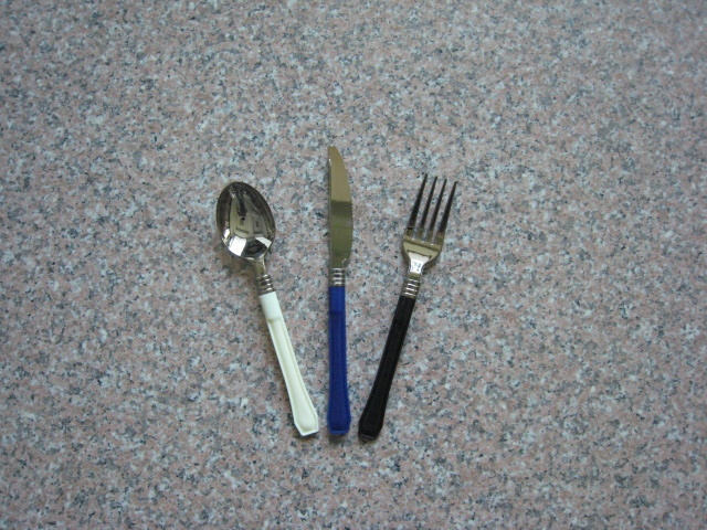 Silver cutlery with colors handel
