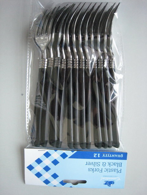 Silver forks with black handel  packing